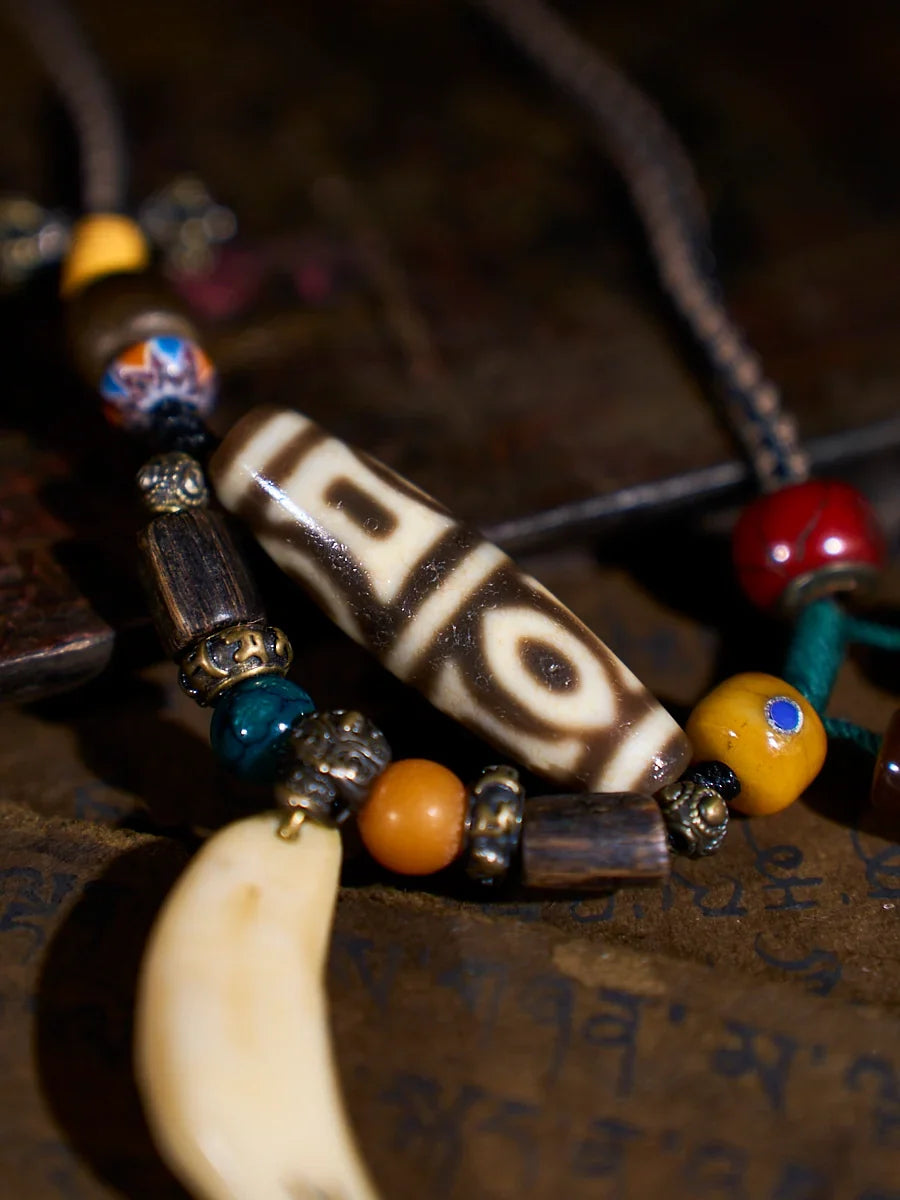 Illuminated Wisdom Phoenix-Eye Four-Eyed Agate Dzi Necklace