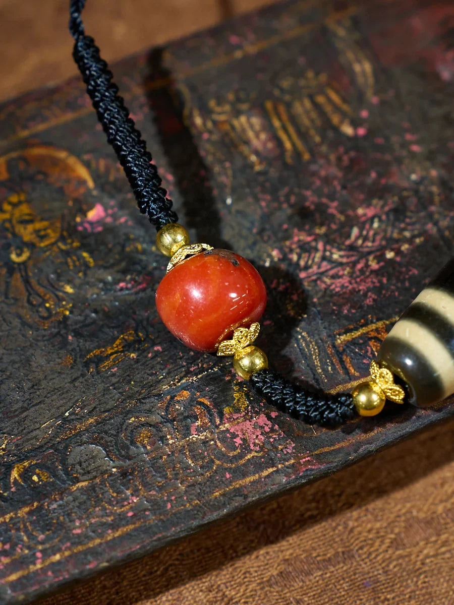 Ancient Clearing · Two-Eyed Dzi & Coral Necklace