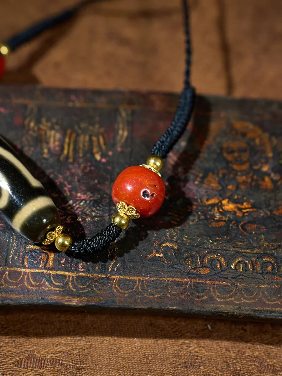 Ancient Clearing · Two-Eyed Dzi & Coral Necklace