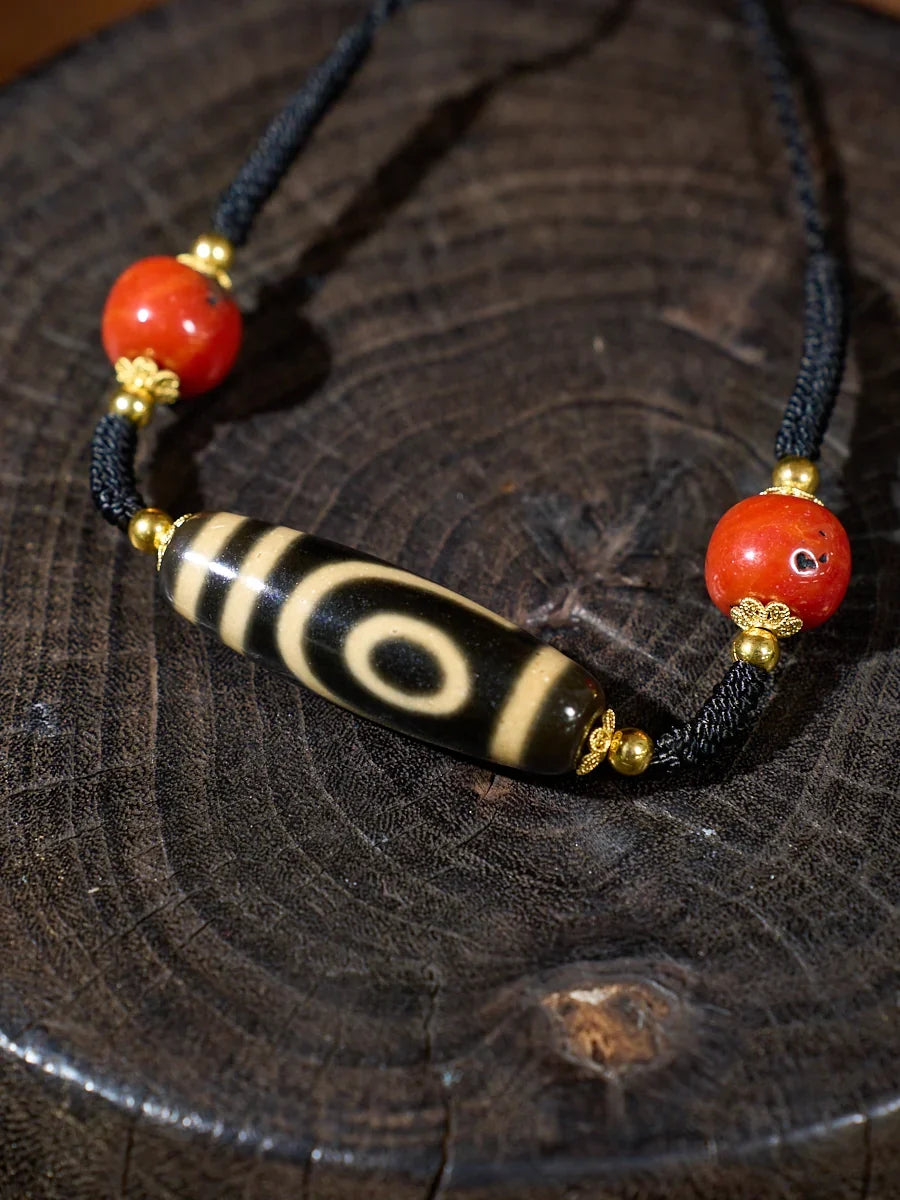 Ancient Clearing · Two-Eyed Dzi & Coral Necklace