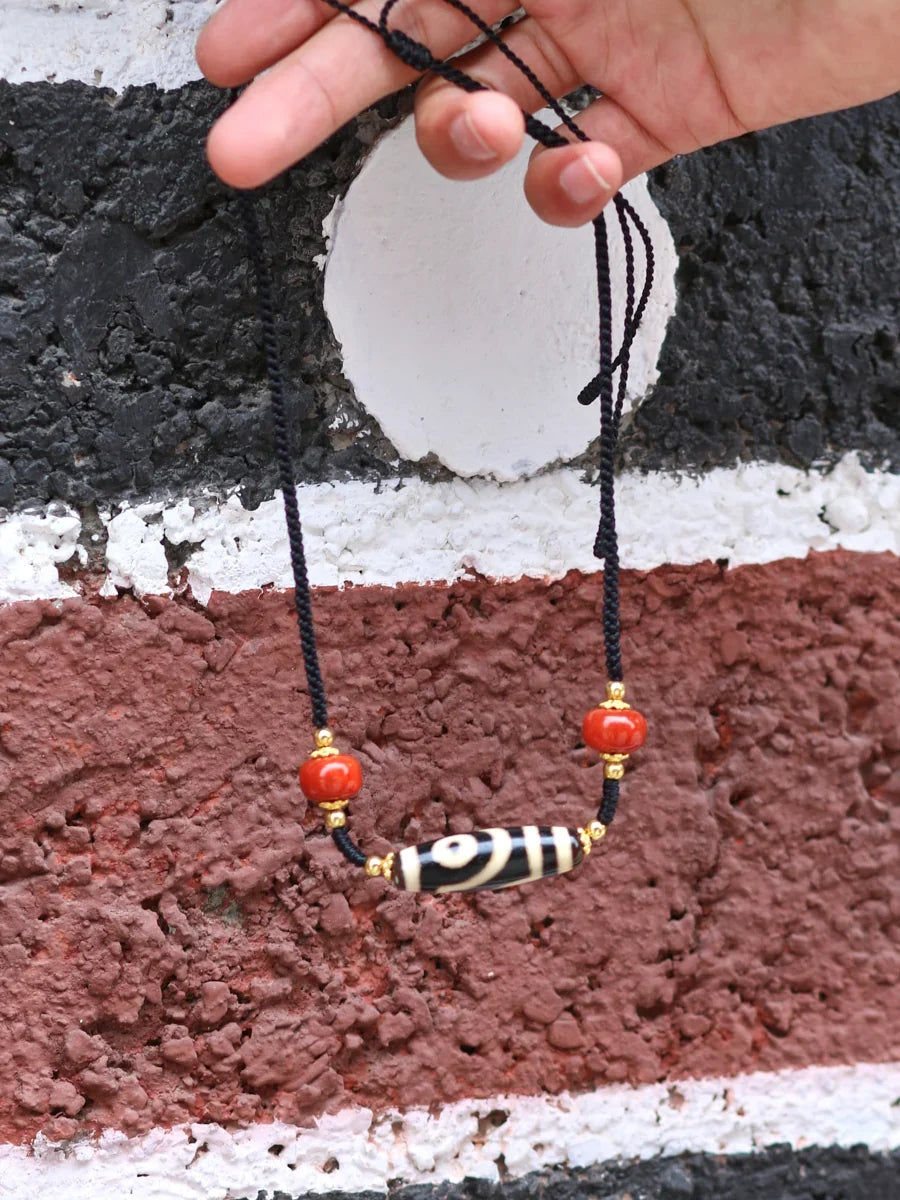 Ancient Clearing · Two-Eyed Dzi & Coral Necklace
